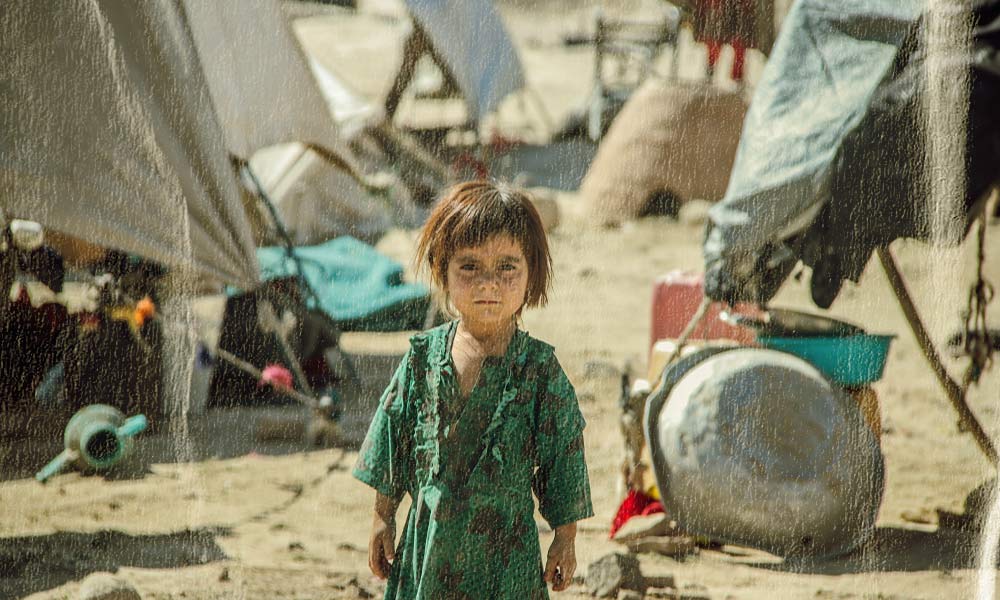 Criança refugiada após o colapso do Afeganistão (1o de agosto de 2021).